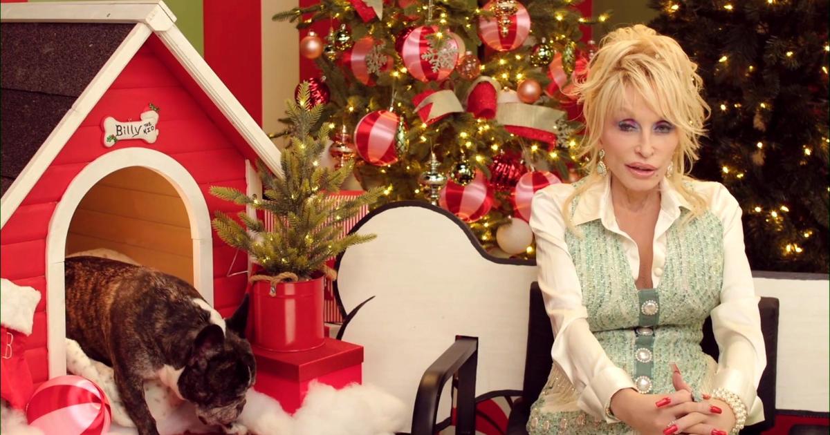 Dolly Parton’s French bulldog faces holiday dilemma in new children’s book, “Billy the Kid Comes Home for Christmas”